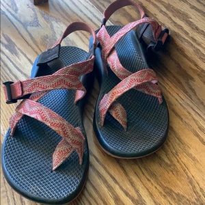 Single strapped chacos with toe strap.